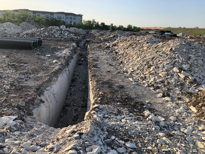 The Wafflemat shallow foundation system is a pt ribbed slab foundation system that uses void forms to build a slab on ground that helps builders avoid interior trenching through rock.